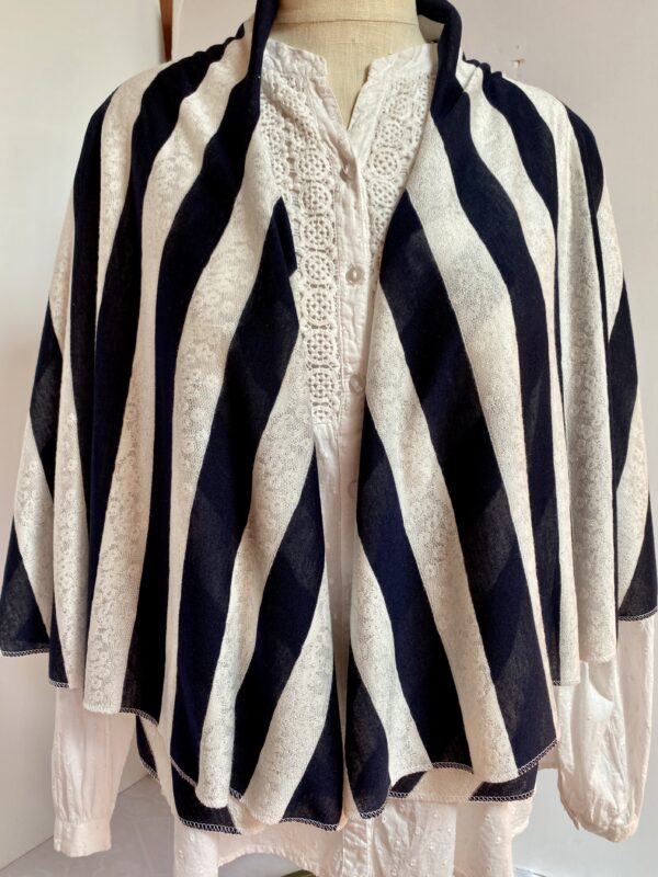Navy and white striped vest worn five different ways - Image 7