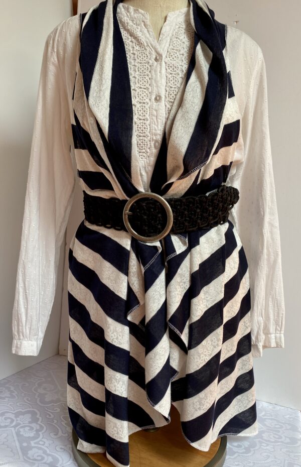 Navy and white striped vest worn five different ways - Image 4