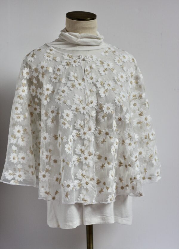 Embroidered flowers on white mesh capelet