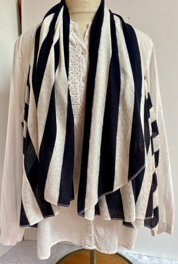 Navy and white striped vest worn five different ways - Image 5