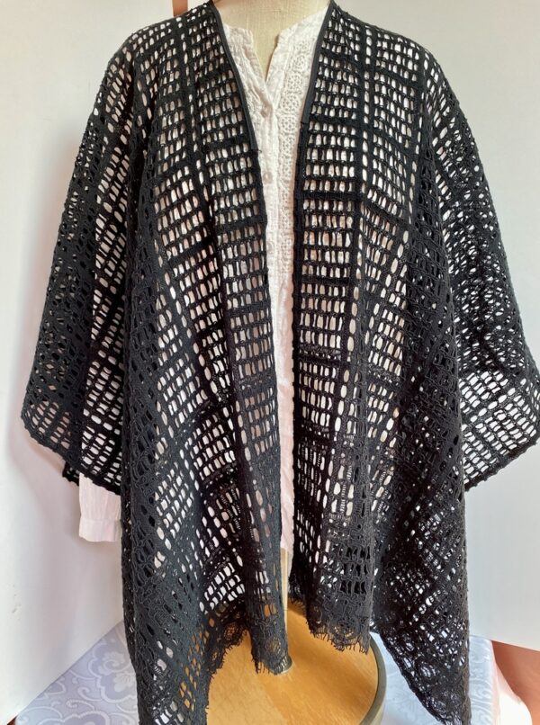 Black lace-type mesh poncho