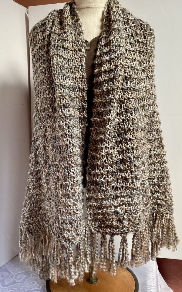 Hand knit shawl in browns, cream, and gray