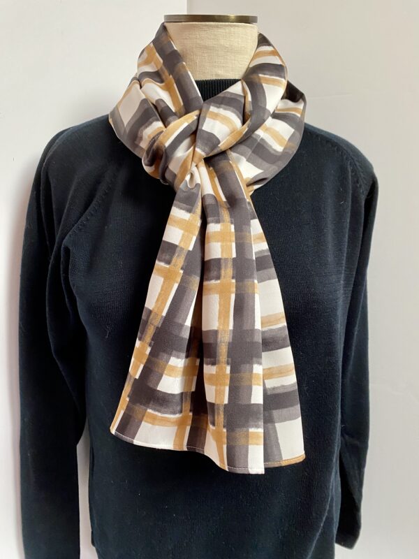 Black, gold, and white windowpane scarf