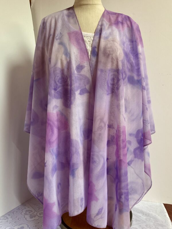 Ruana poncho in purple floral mesh