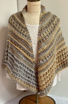 Hand knit shawl in gold, brown and gray