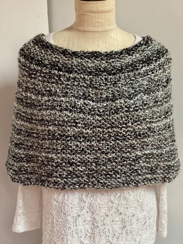 Hand knit coverlet in black, white and gray tweed