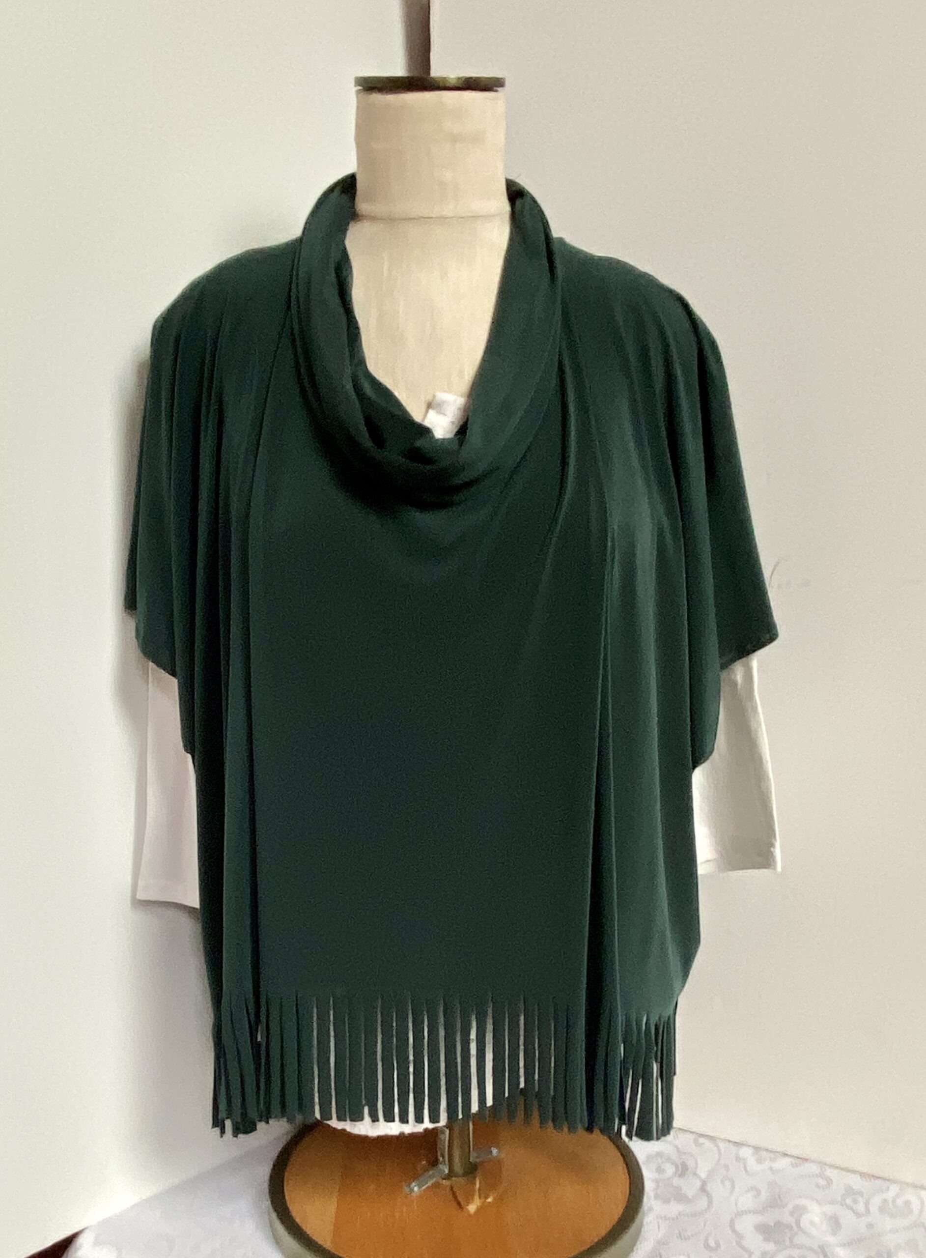 Green tunic with fringe